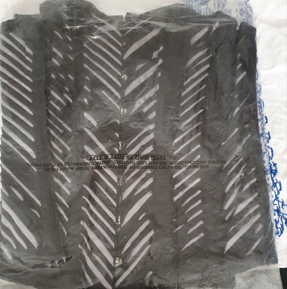 Black and Silver ridged corset, boning on the fashion side for a long line look.